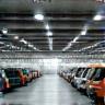 Row of vehicles in secure facility.